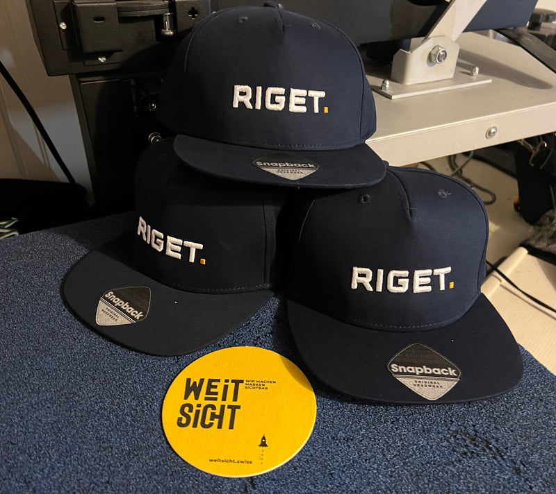 Teamcaps für Riget.ch
